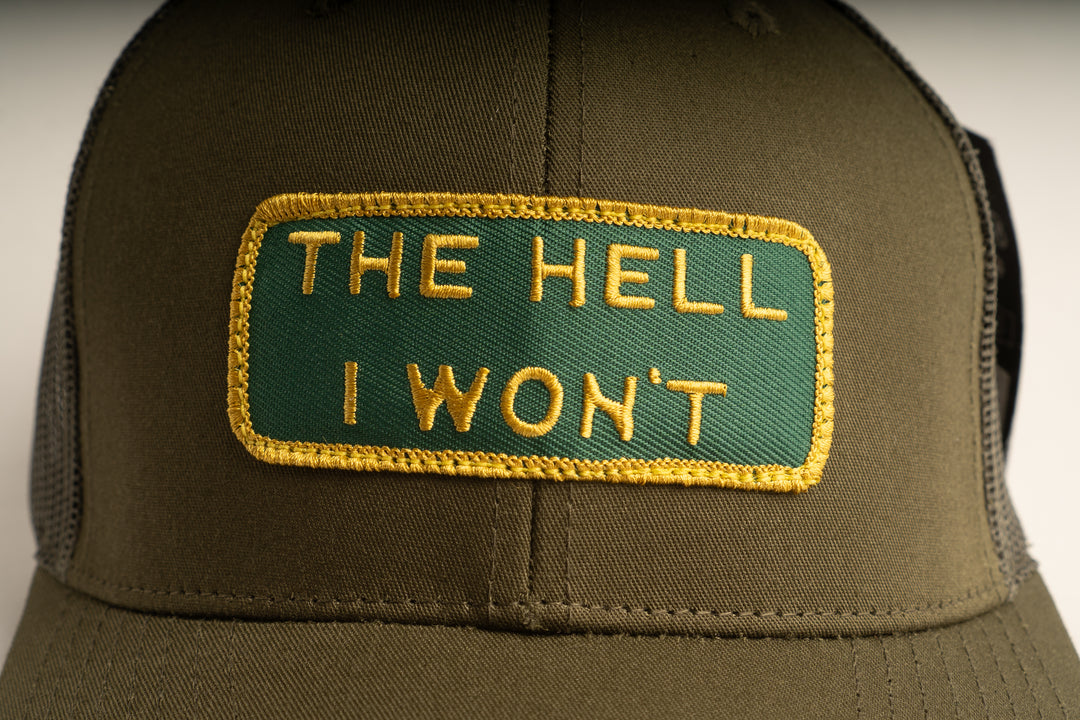 "THE HELL I WON'T" Olive Trucker hat