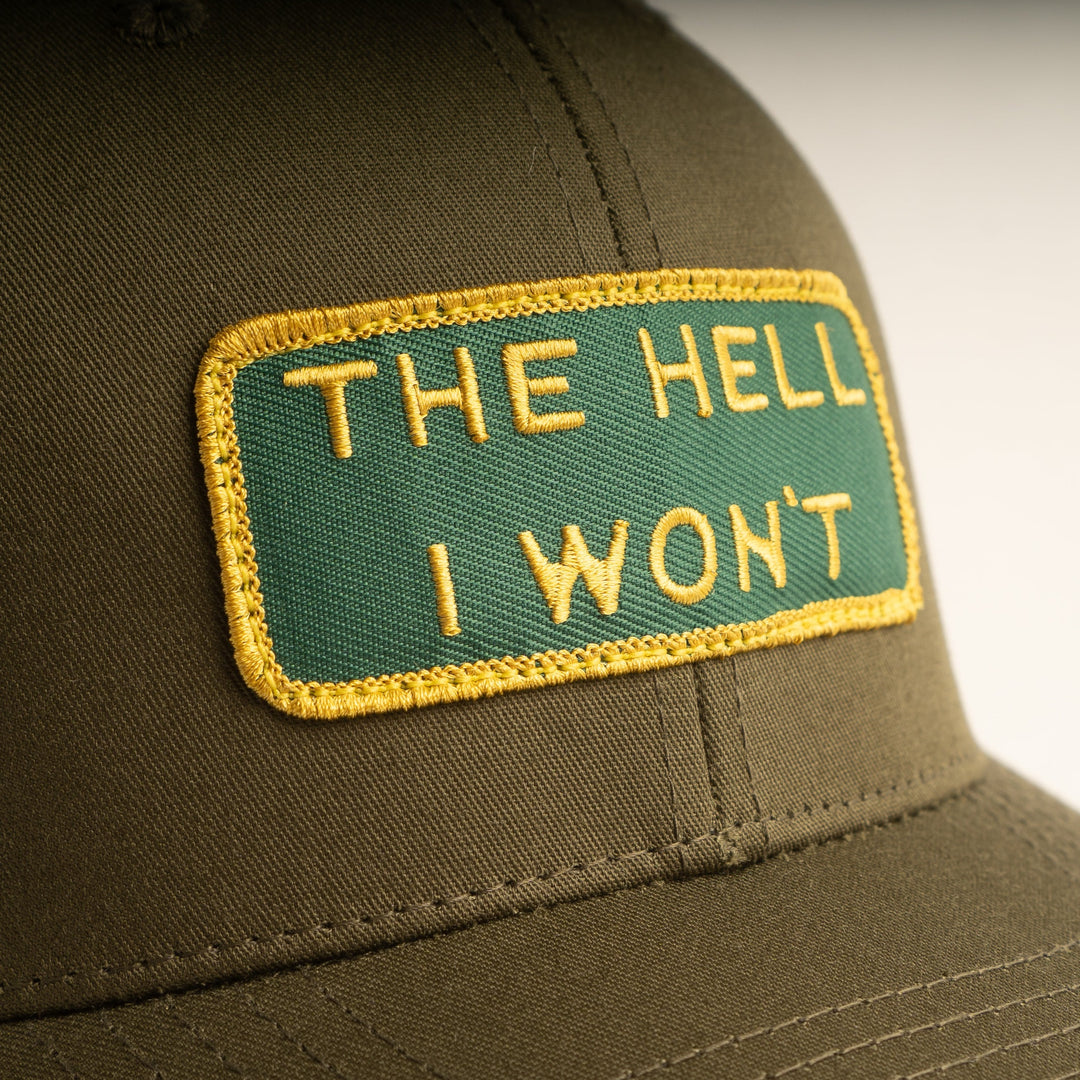 "THE HELL I WON'T" Olive Trucker hat