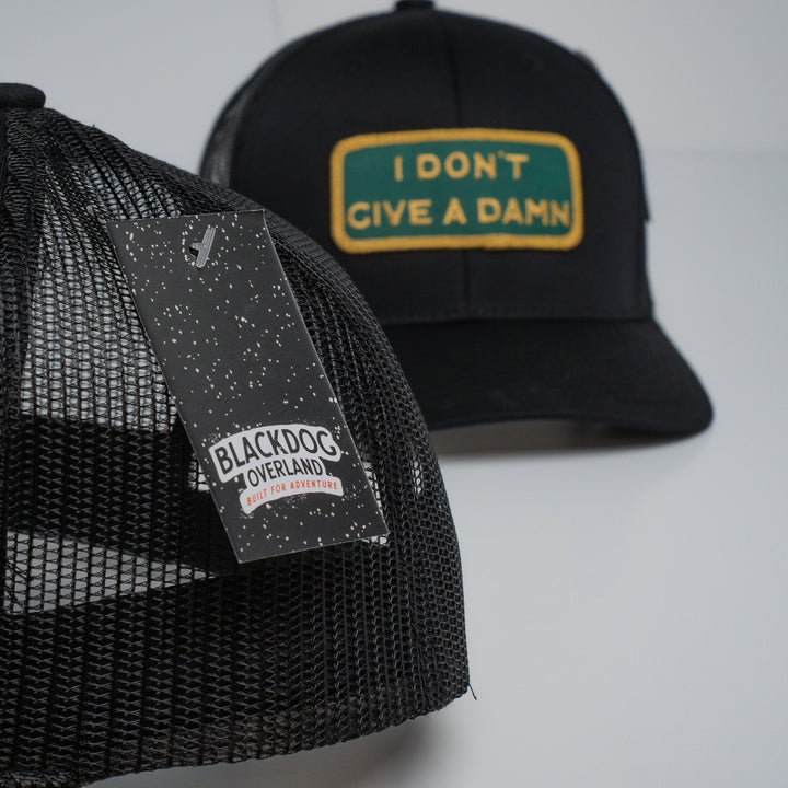 "I DON'T GIVE A DAMN" Black Trucker hat